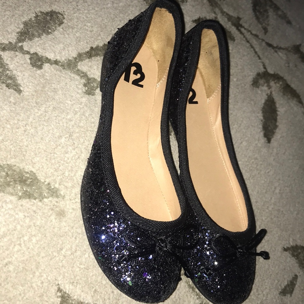 Never worn black sparkly flats.